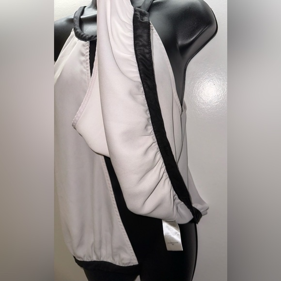 BEBE | Small Sleeveless Wrap Style Blouse with Keyhole Faux Leather Halter Neck - Picture 7 of 15